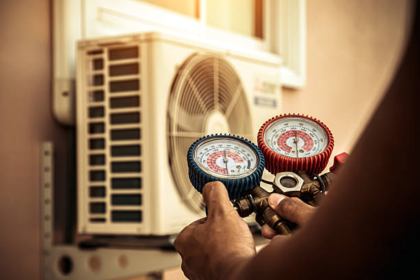 Professional Hvac technician working in Hollis, NY